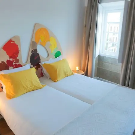 & Suites אכסניה קמיניה